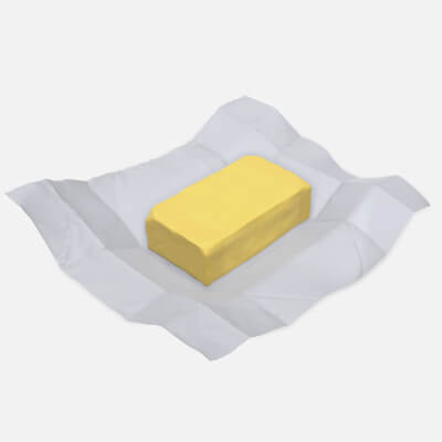 Butter with Paper on Ground